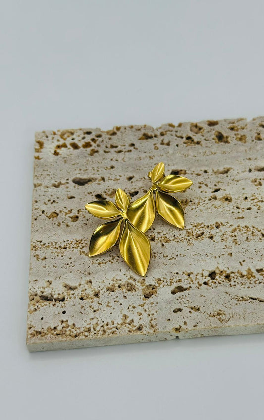 orecchini mezzo fiore oro